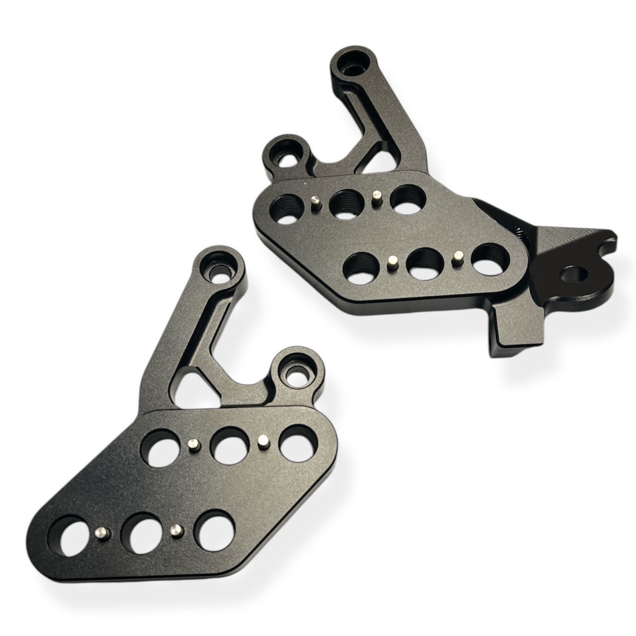 Black DEEP STATE Surron Adjustable Footpeg Brackets