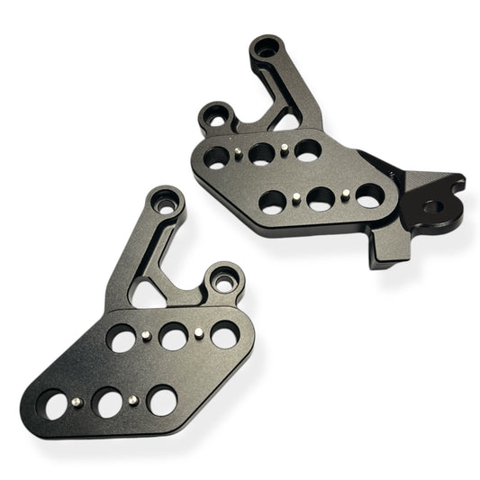 Black DEEP STATE Surron Adjustable Footpeg Brackets